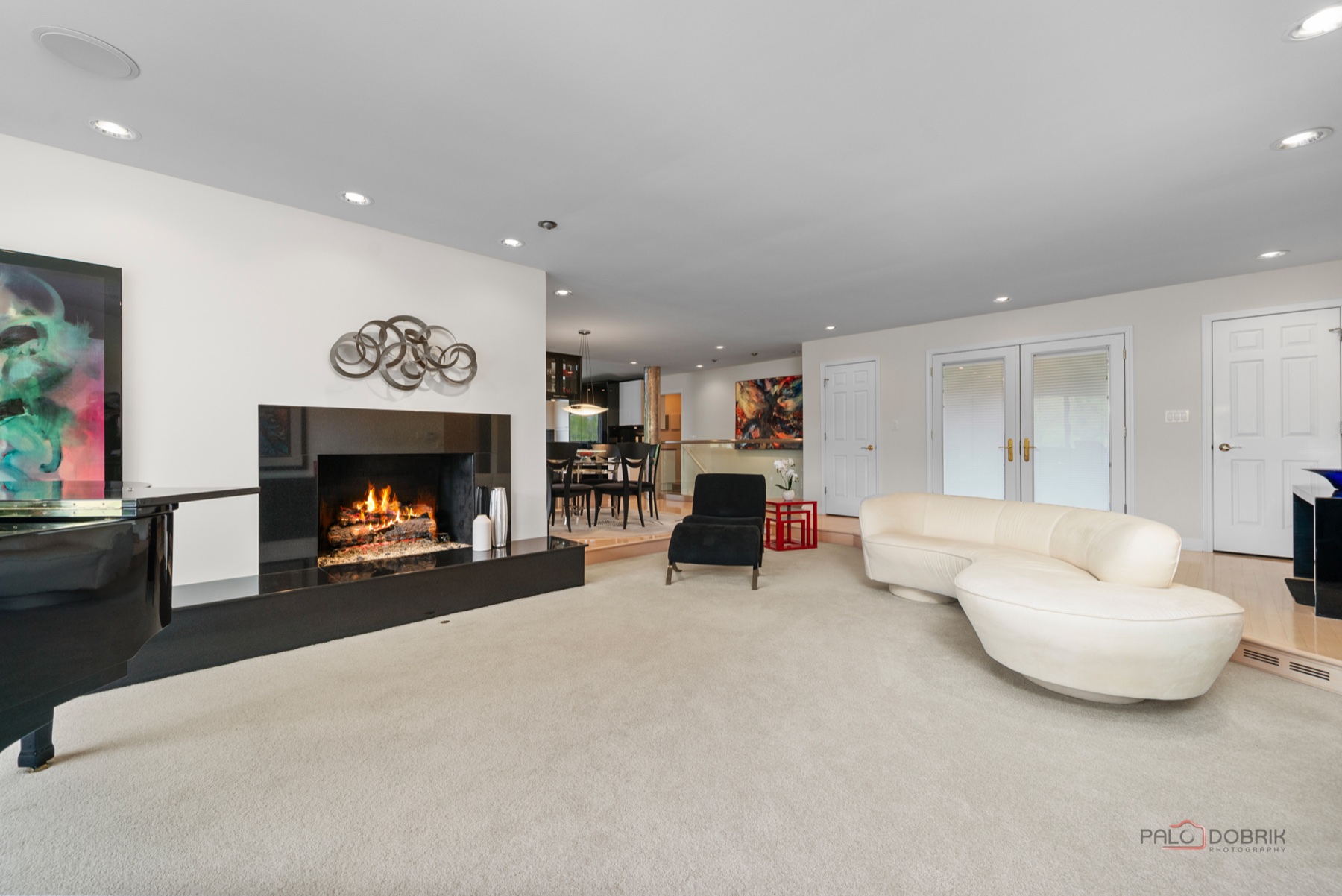 Finished living room with fireplace after a complete renovation
